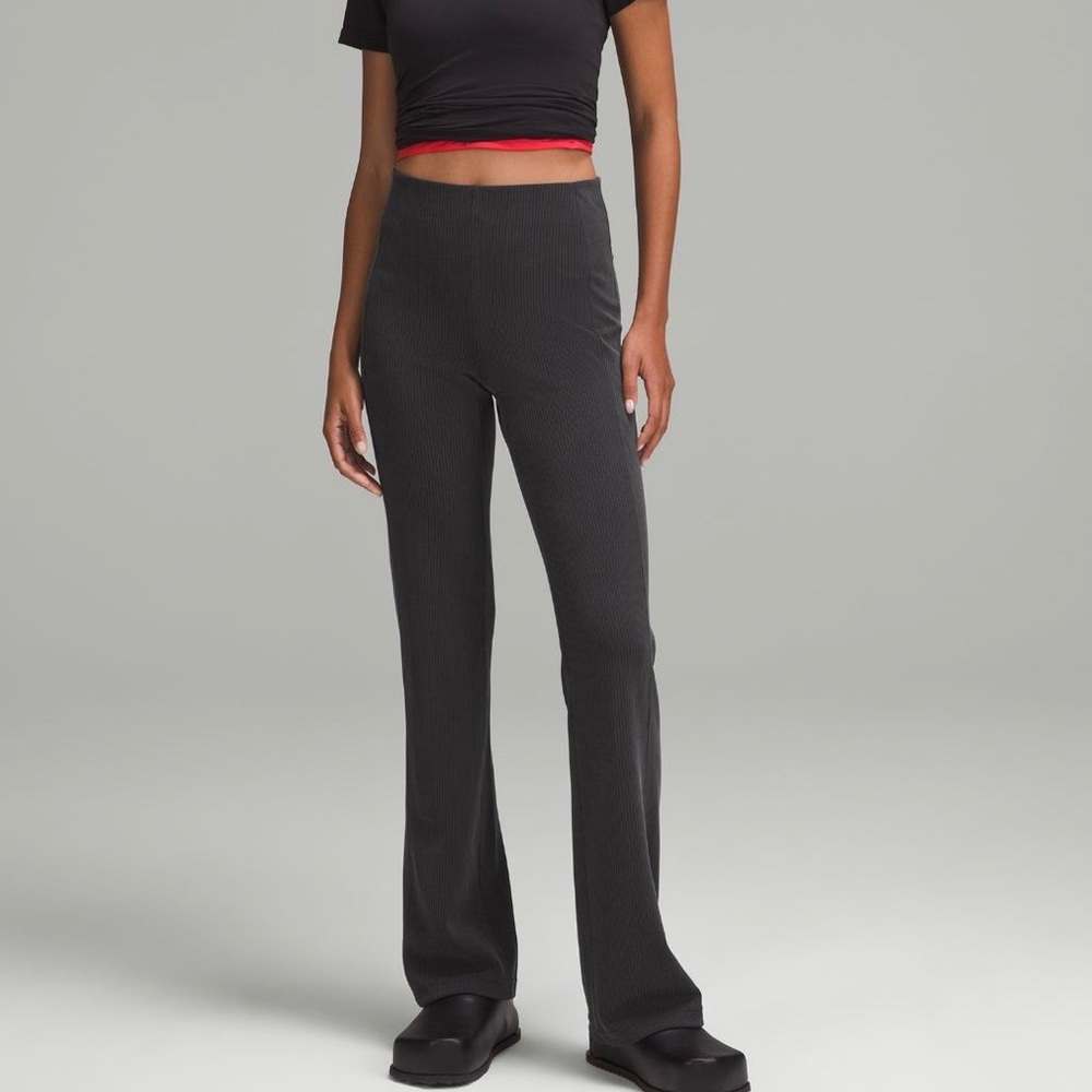 Like New Lululemon Athletica Ribbed Softstreme Flared Leg Pant, Black/Dk. Gray 8 - Picture 5 of 13